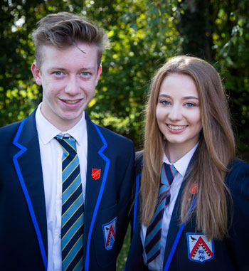 Male and female pupils in school uniform at The Maelor School