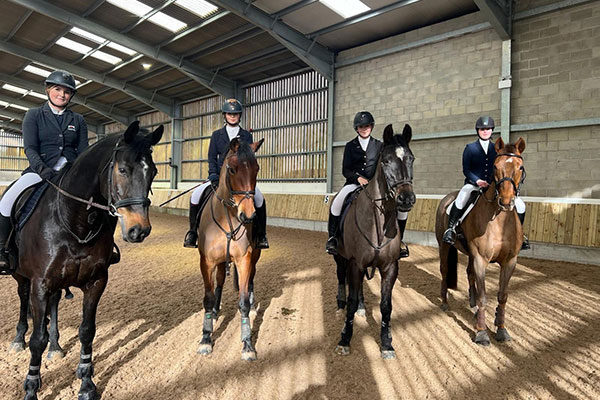 High school children horse riding in Wrexham