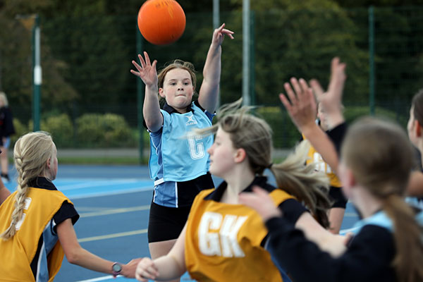 Girls playing netball