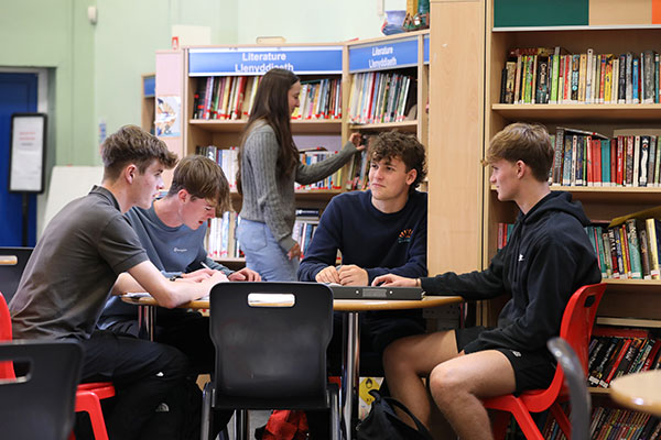 Group of students studying in Wrexham school